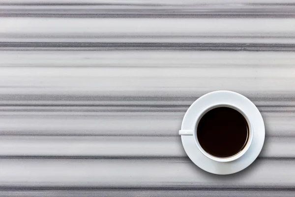Taza de café blanco sobre tabla de piedra vista superior de fondo — Foto de Stock