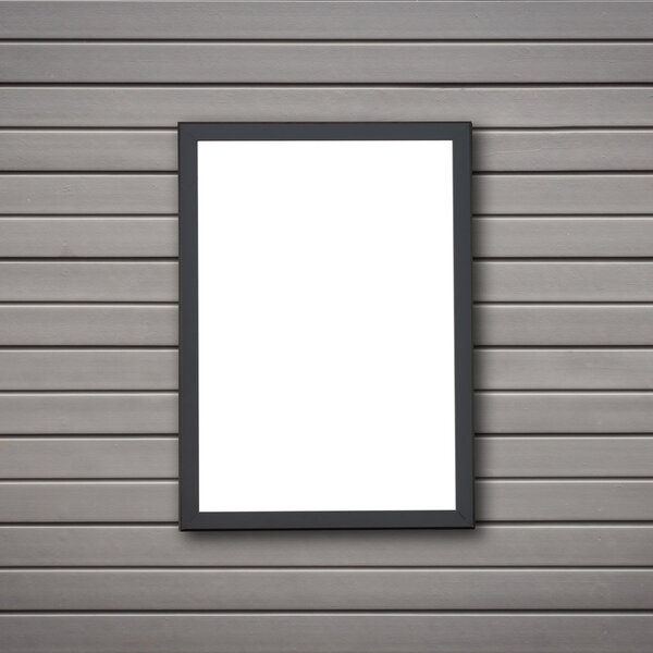 Blank of wooden photo frame on stone wall background