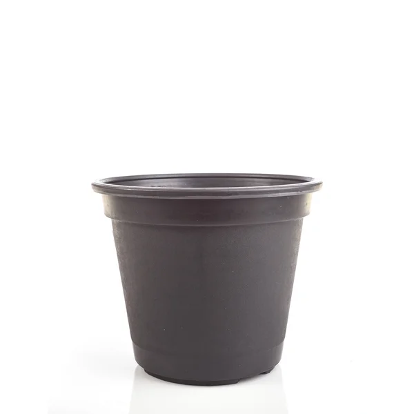 Black empty plastic bucket for seedlings isolated white — Stock Photo, Image