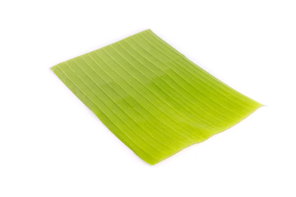 Taze yeşil muz yaprağı üzerinde beyaz izole — Stok fotoğraf