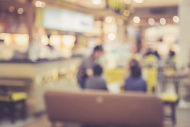 İnsanların kafede bokeh, vintage renk ile bulanık görüntü