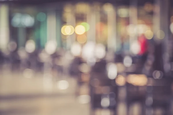 Blurred image of people in coffee shop with bokeh, vintage color — Stock Photo, Image