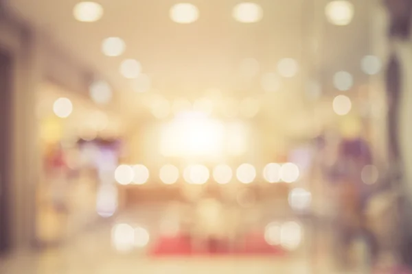 Image abstraite floue de lumière avec bokeh dans le centre commercial, vinta — Photo