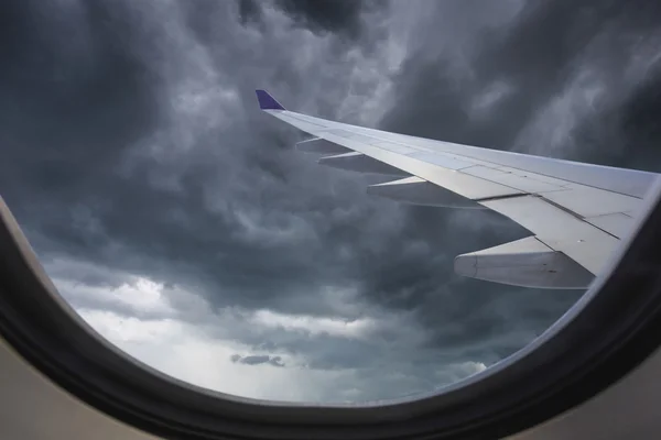 View of beautiful cloud and wing of airplane from window — Stock Photo, Image