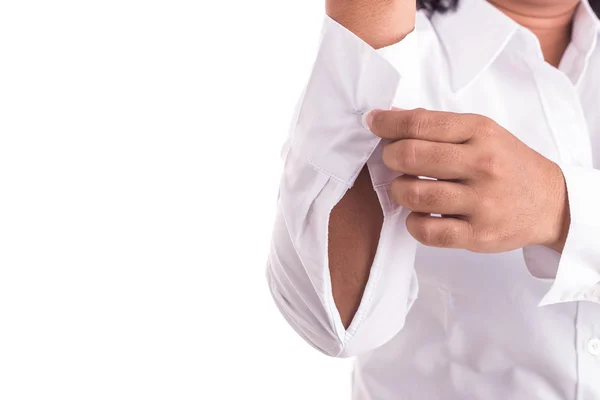Рука жінки, що тримає запонки ізольовані на білому тлі — стокове фото