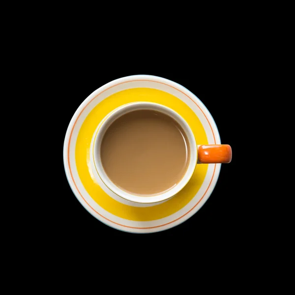 Top view yellow coffee cup isolated on black. Saved with clippin — Stock Photo, Image