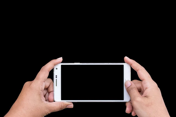 Close up hand of woman holding smartphone isolated on black. Sav — Stock Photo, Image