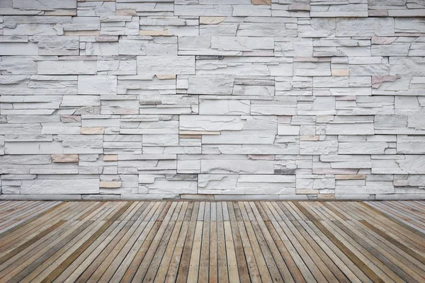 Dessus vide de plancher en bois et mur en pierre naturelle — Photo