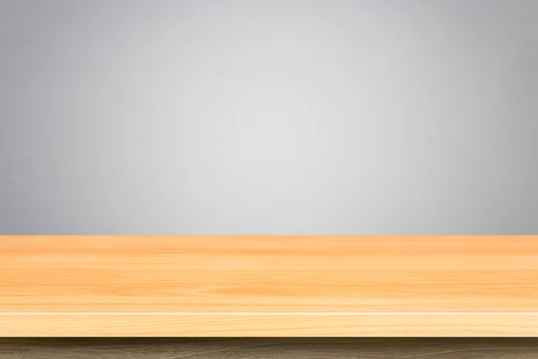 Tavolo vuoto superiore in legno e sfondo muro di pietra naturale — Foto Stock