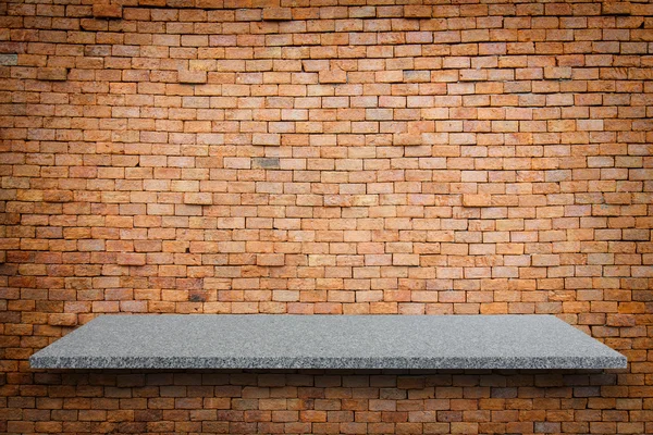 Parte superior vacía de estantes de piedra natural y fondo de pared de piedra —  Fotos de Stock