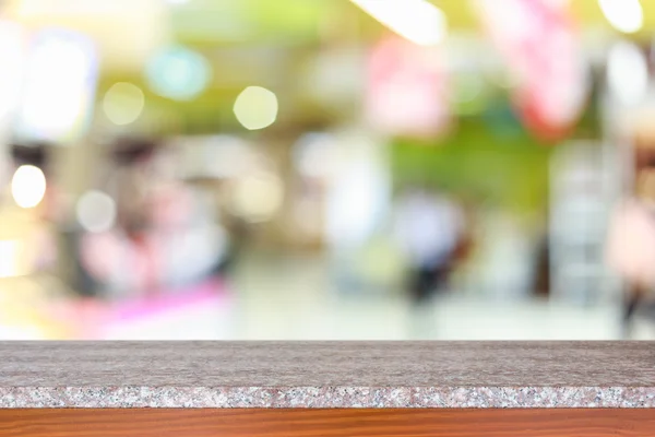 Parte superior vacía de la mesa de piedra natural y desenfoque con fondo bokeh —  Fotos de Stock