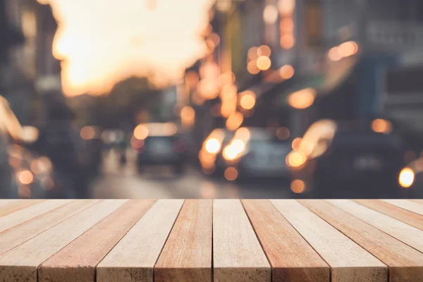 Table en bois vide et flou avec fond bokeh — Photo