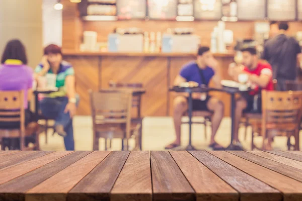 Mesa de madera superior vacía y desenfoque con fondo bokeh — Foto de Stock