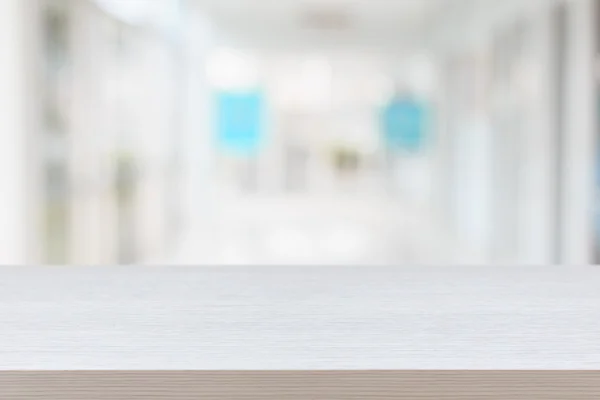 Empty top of wooden table or counter on blurred abstract backgro — Stock Photo, Image