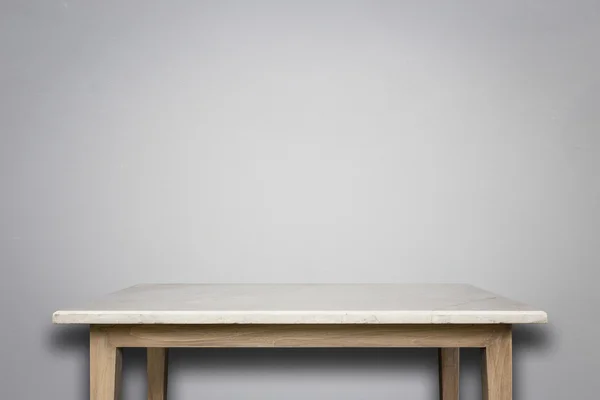 Lege boven aan natuurlijke stenen tafel en stenen muur achtergrond — Stockfoto