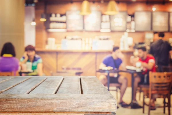 Mesa de madera superior vacía y desenfoque con fondo bokeh — Foto de Stock