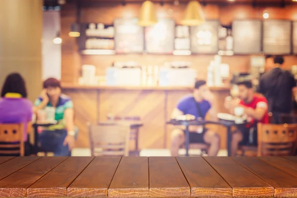 Mesa de madera superior vacía y desenfoque con fondo bokeh — Foto de Stock