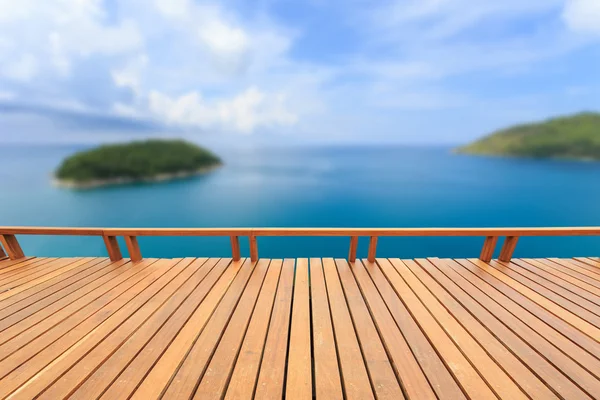 Wooden decking or flooring and tropical beach — Stock Photo, Image