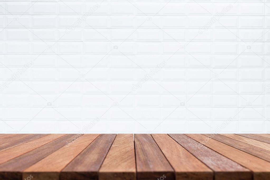 Empty top wooden table and stone wall background