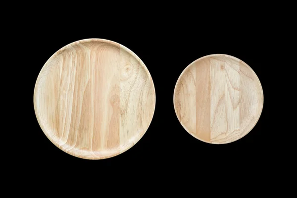 Вид зверху яскрава порожня дерев'яна тарілка ізольована на білому. Збережено за допомогою — стокове фото