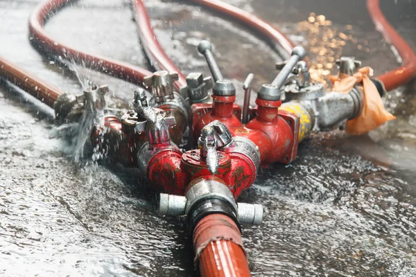 Fire Water hose connector on the ground — Stock Photo, Image