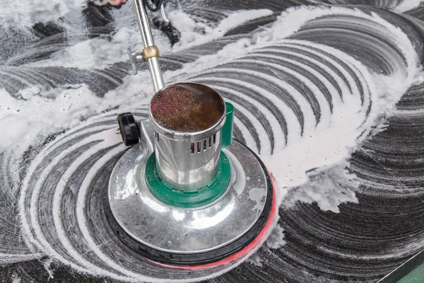 Thai people cleaning black granite floor with machine and chemic — Stock Photo, Image