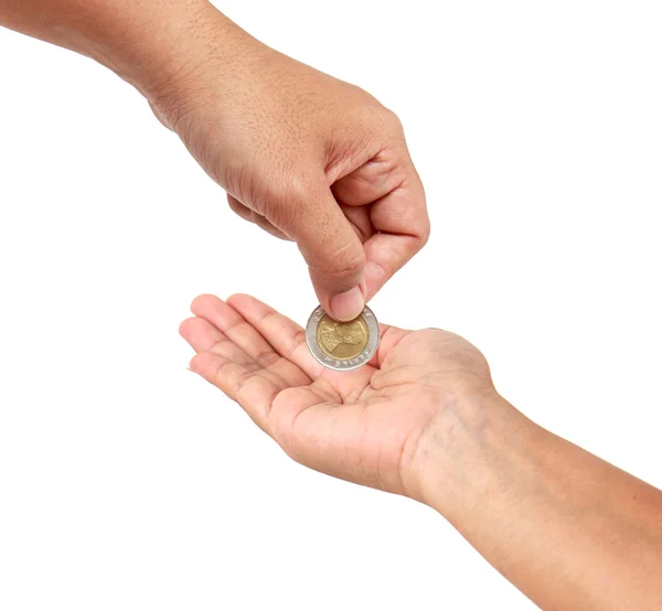 Vrouw hand met munt isoleert op witte achtergrond — Stockfoto
