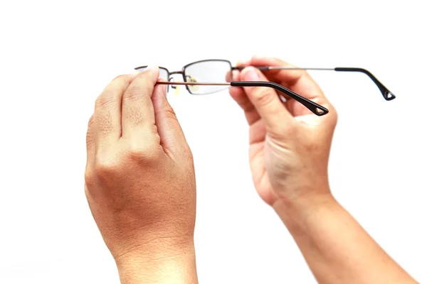 Hand hält Brille isoliert auf weißem Hintergrund — Stockfoto
