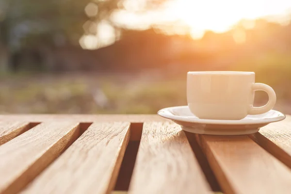 A cup of coffee on the table — Stock Photo, Image