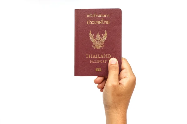 Mão segurando passaporte Tailândia isolado no fundo branco — Fotografia de Stock