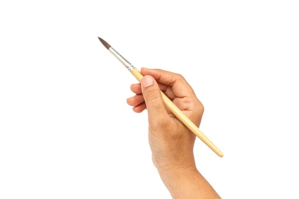 Hand holding paintbrush isolated on white backgroun — Stock Photo, Image