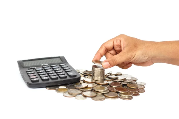 Hand met munt met calculator geïsoleerd op witte achtergrond — Stockfoto