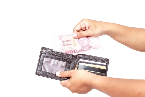 Hand met Thaise geld geïsoleerd op wit. — Stockfoto