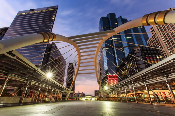 Sky walk architecture like a spider for passengers to transit between Sky Transit and Bus Rapid Transit Systems at Sathorn-Narathiwas junction on AUG 11, 2014 in Bangkok, Thailand.