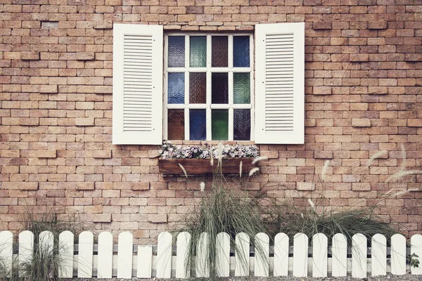 Vintage style Windows on brick wall — Stock Photo, Image