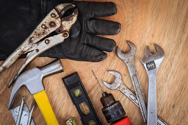 Closeup of assorted work tools on wood — Stock Photo, Image