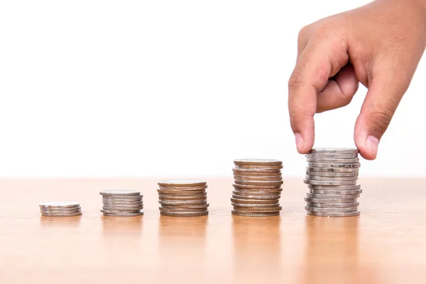 Close up of hand put coins to Stack Of Coins — Stock Photo, Image