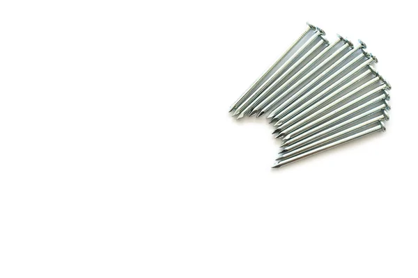 Metalowe paznokcie izolowane na białym tle — Zdjęcie stockowe