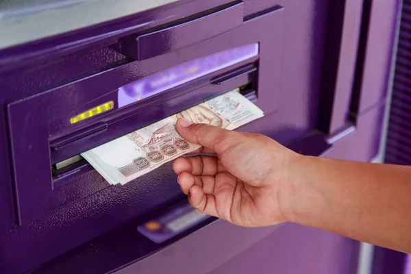 Close up of hand take money from ATM bank machine — Stock Photo, Image