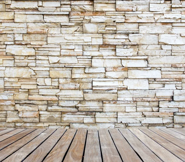Old stone wall with wood decking — Stock Photo, Image