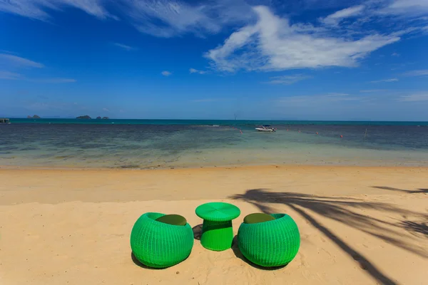 Modern seats stand on the beack, tropical sea and blue sky in Ko — Stock Photo, Image