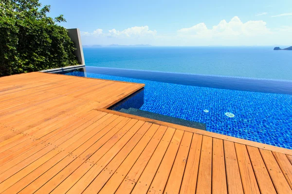 Wooden flooring beside the pool — Stock Photo, Image