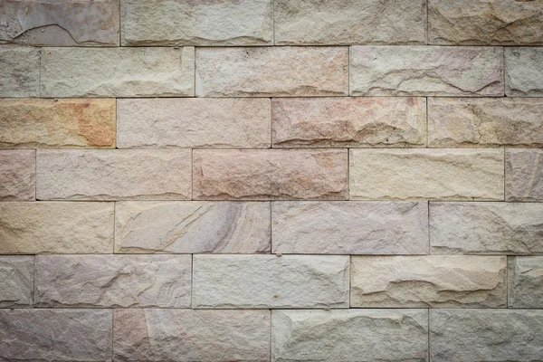 Текстура стен из песчаника для фона — стоковое фото