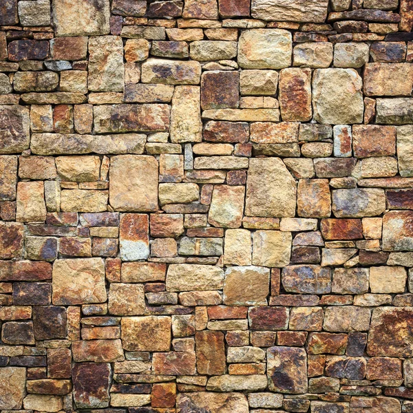 Textur der Natursteinwand für den Hintergrund — Stockfoto