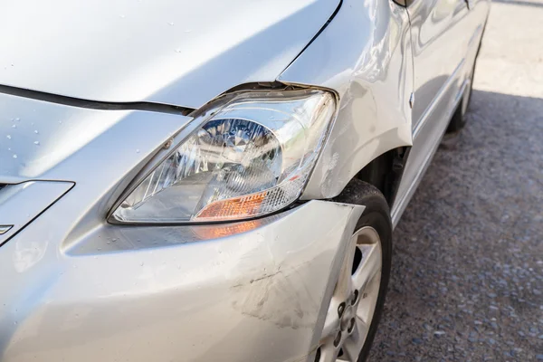 Body of blue car get damaged by accident — Stock Photo, Image