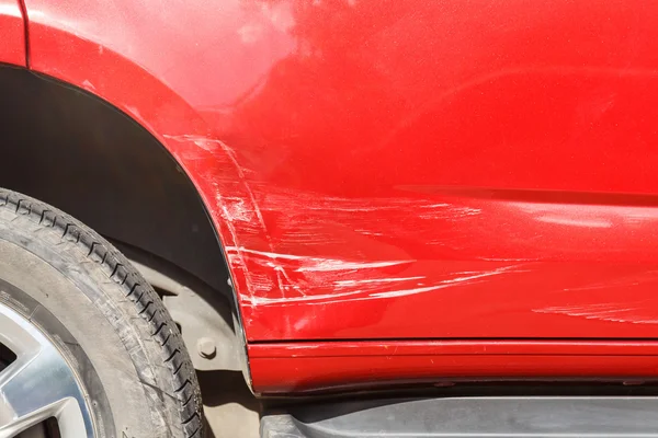 Body of blue car get damaged by accident — Stock Photo, Image