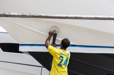 Boat in maintenance in Phuket, Thailand clipart