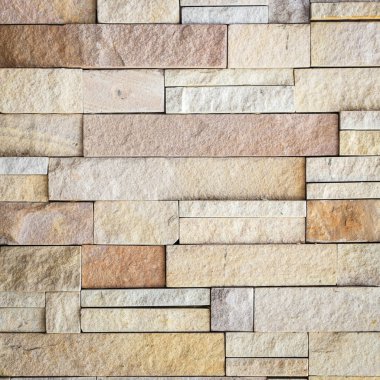 Kumtaşı duvar doku arka planı için