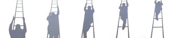 Schatten des Arbeiters, der auf Leiter klettert — Stockfoto