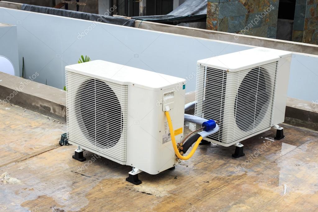 Air conditioner on the roof — Stock Photo © PhanuwatNandee #59437381